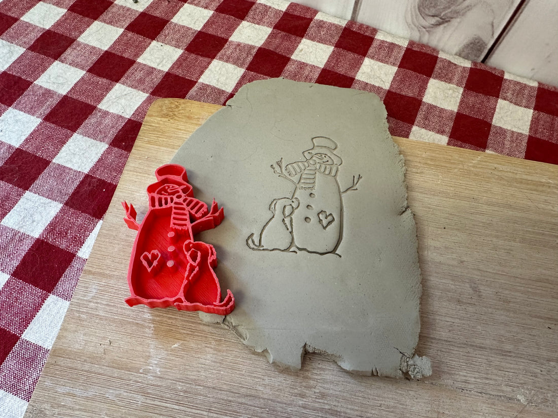 Snowman with Dog design pottery stamp